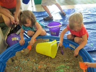 two girls in the sandbox